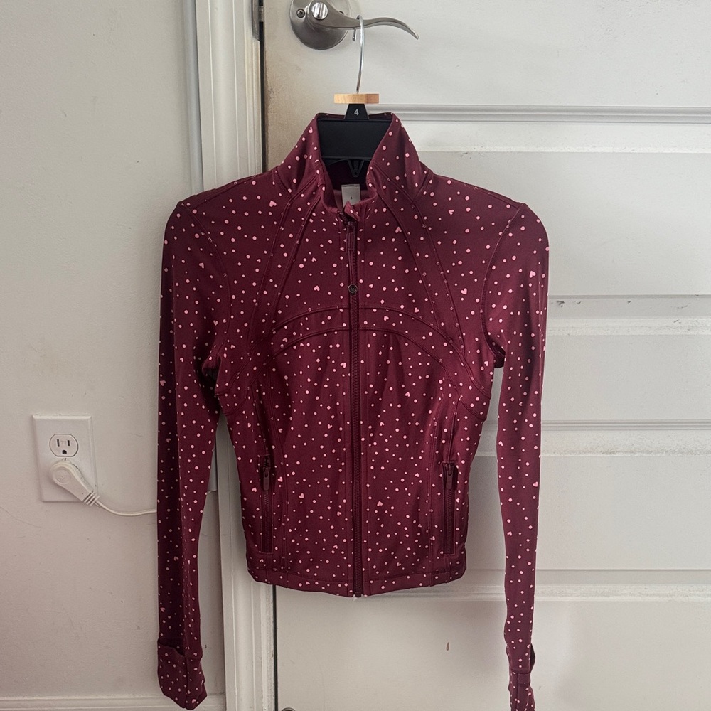 Lululemon scattered pink hearts collection jacket 
Limited edition
